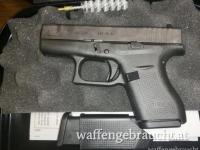 Glock 42 im Kaliber .380 Auto mit zweitem Magazin, Ladehilfe, Putzzeug und Transportkoffer