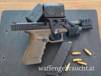 Glock17 mit Kompensatorlauf, Red Dot und diversen Zubehör 