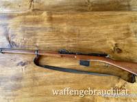 Schweizer Langgewehr 1889 im Kaliber 7,5x53mm mit Originalriemen und Mündungsschoner