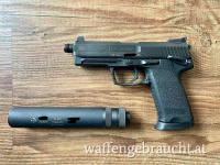 Heckler & Koch USP Tactical Cal. 45 ACP & B&T Schalldämpfer & Black Trident Holster